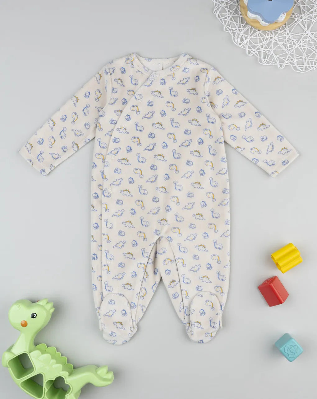 Prenatal Beige baby romper with all-over dinosaurs