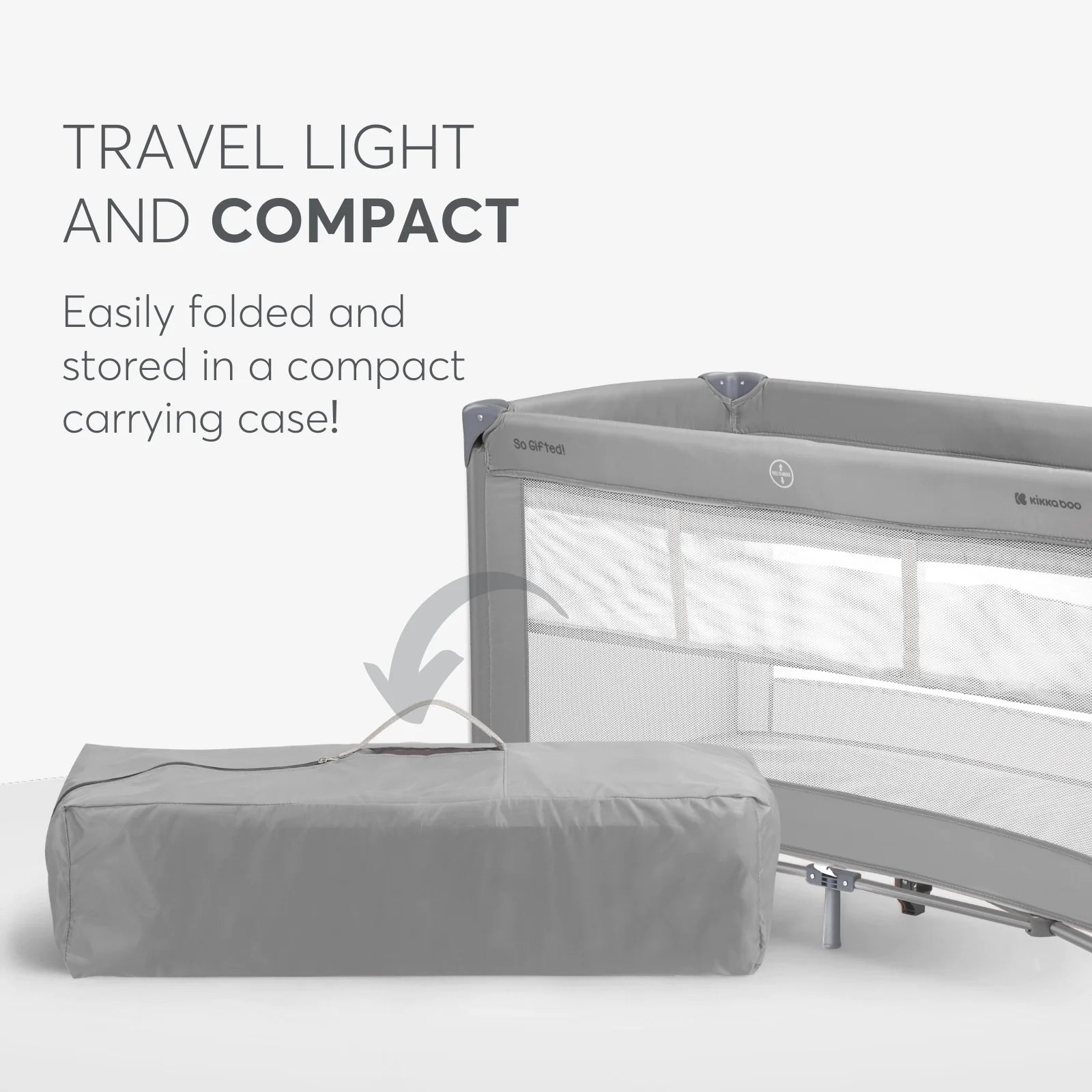 Compact travel crib with carrying case on a white background