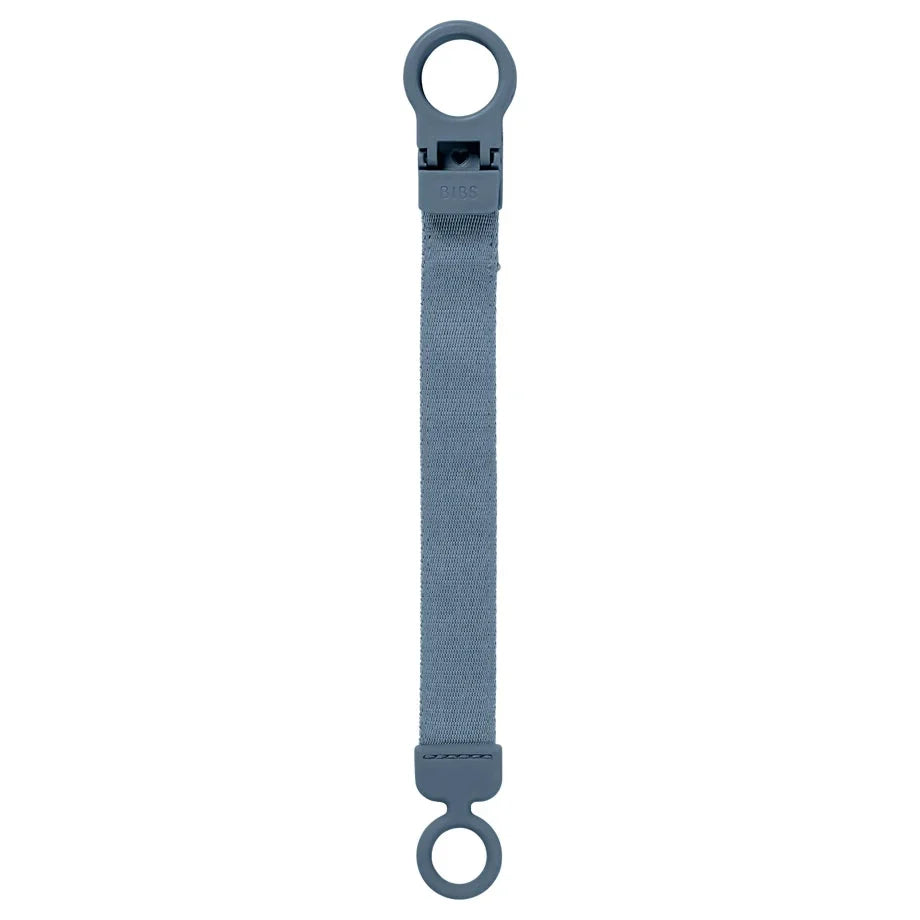 Petrol-blue pacifier clip with fabric strap and two plastic loop ends