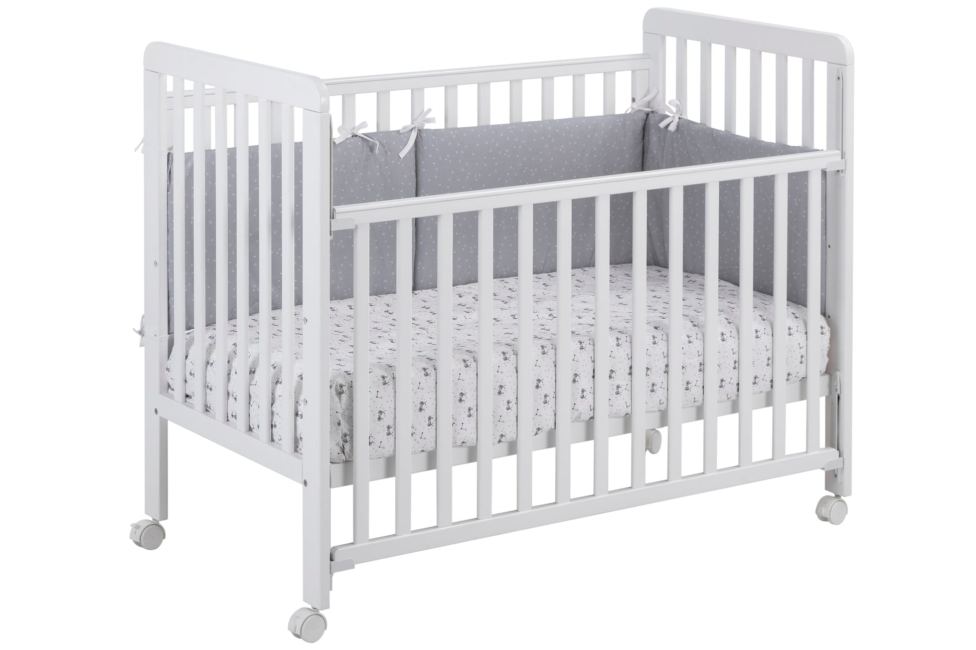 IKID Bari white baby cot 60x120cm with drop-side mechanism and beechwood frame