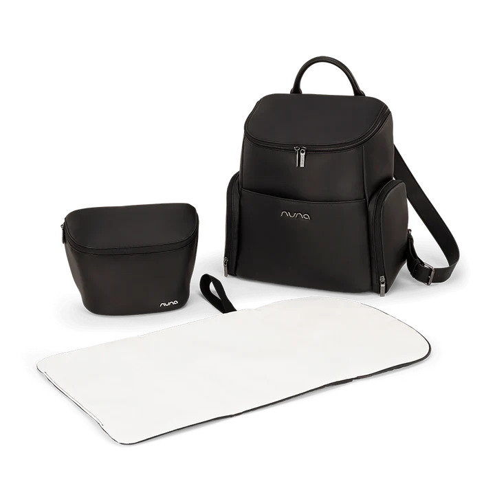 Black caviar-style backpack with matching small pouch and white mat