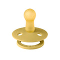 Mustard baby pacifier with round shield and vent holes