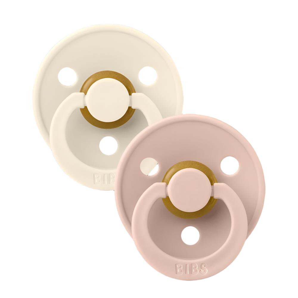 2-pack pacifiers: ivory and blush guards with translucent nipples and BIBS logo