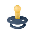 Dark blue baby pacifier with yellow nipple and round shield with vent holes
