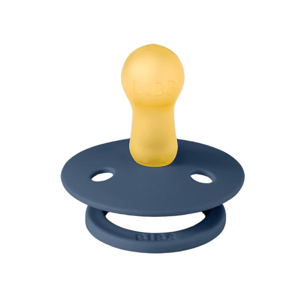Dark blue baby pacifier with yellow nipple and round shield with vent holes