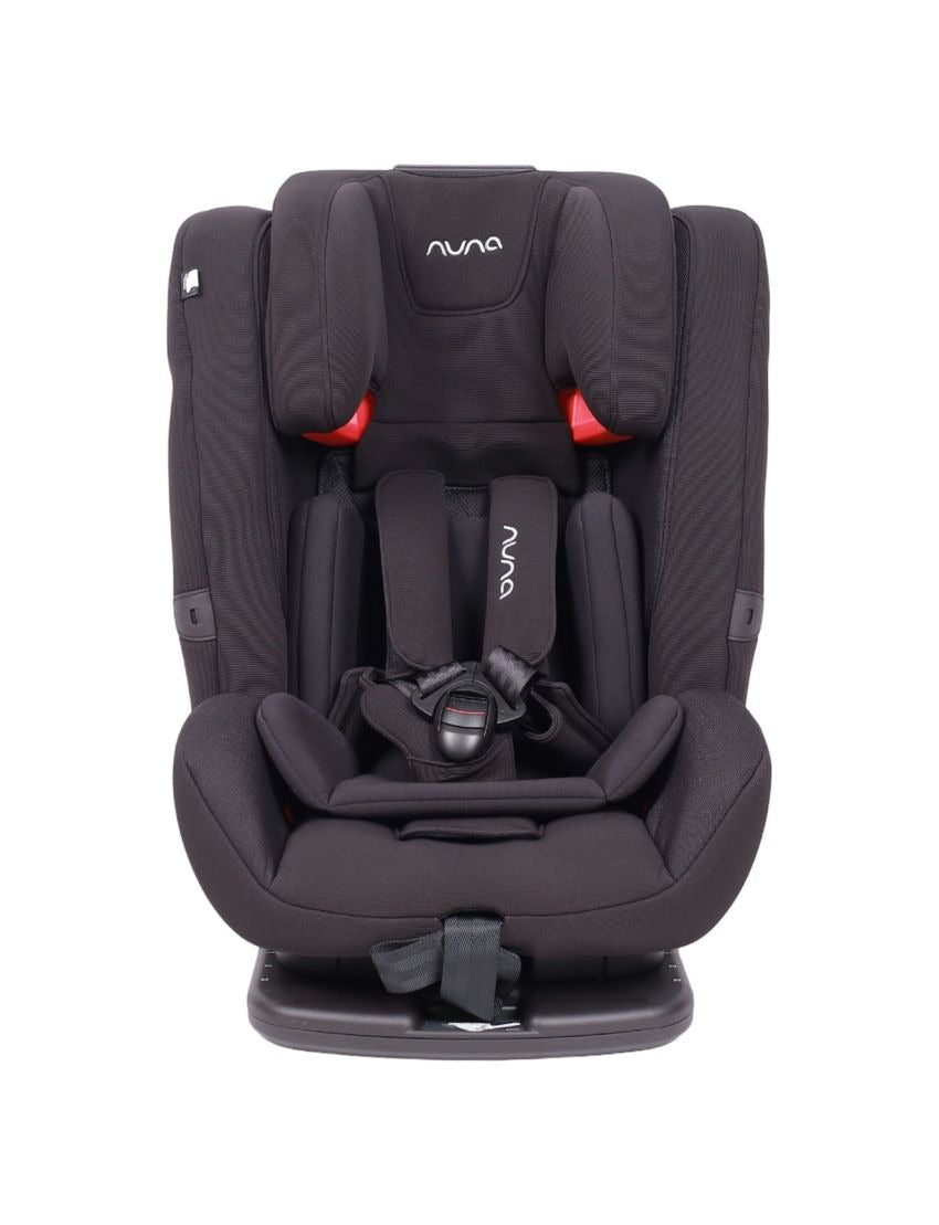 Dark child car seat front view with Nuna logo and padded center harness