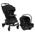 Black stroller and car seat on a white platform with Joie branding.